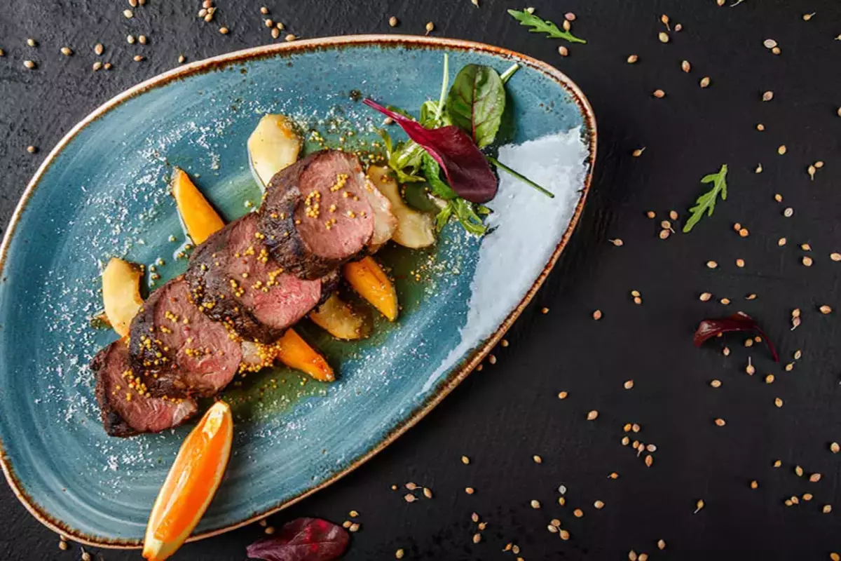 A juicy, pink sliced duck breast