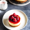 a raspberry and white chocolate cheesecake